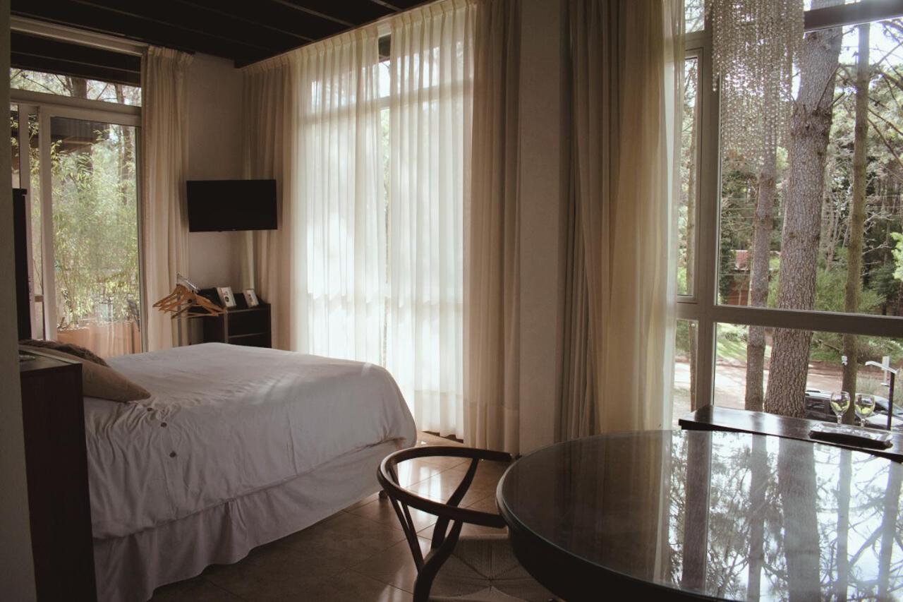 Aparthotel Sonidos Del Bosque Mar de Las Pampas Exterior foto